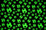 Soccer Balls on Green Background